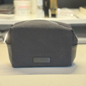 Yves Saint Laurent Parfumes Black Toiletry Bag with Structured Design